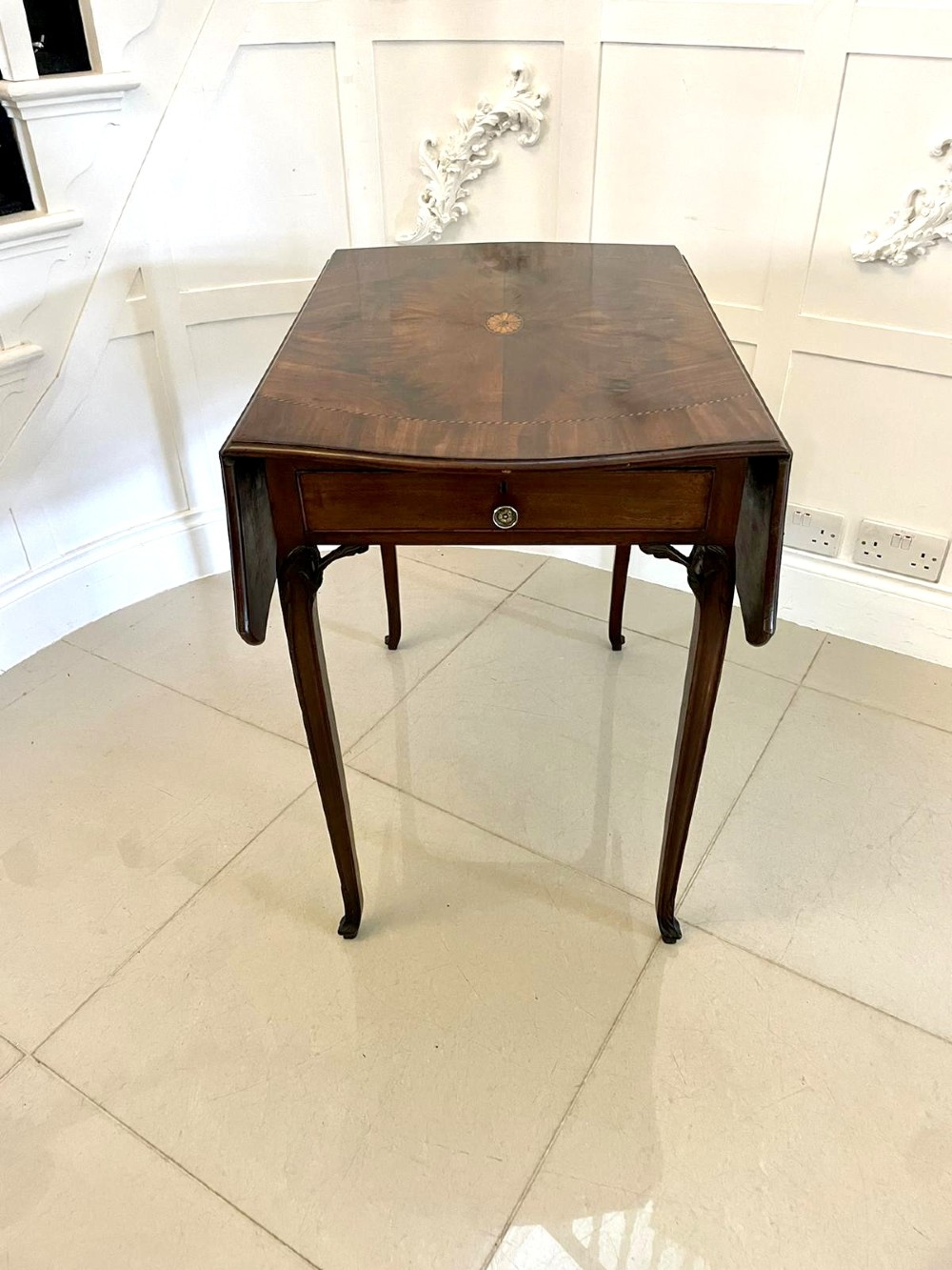 An eighteenth-century George III mahogany Pembroke table with butterfly drop leaves, central fan inlay, and slender legs. View XII