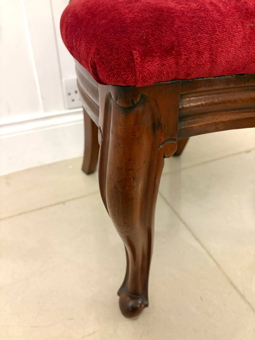 A set of six Victorian mahogany balloon back dining chairs with cabriole legs and crimson red velvet upholstered seats. View V