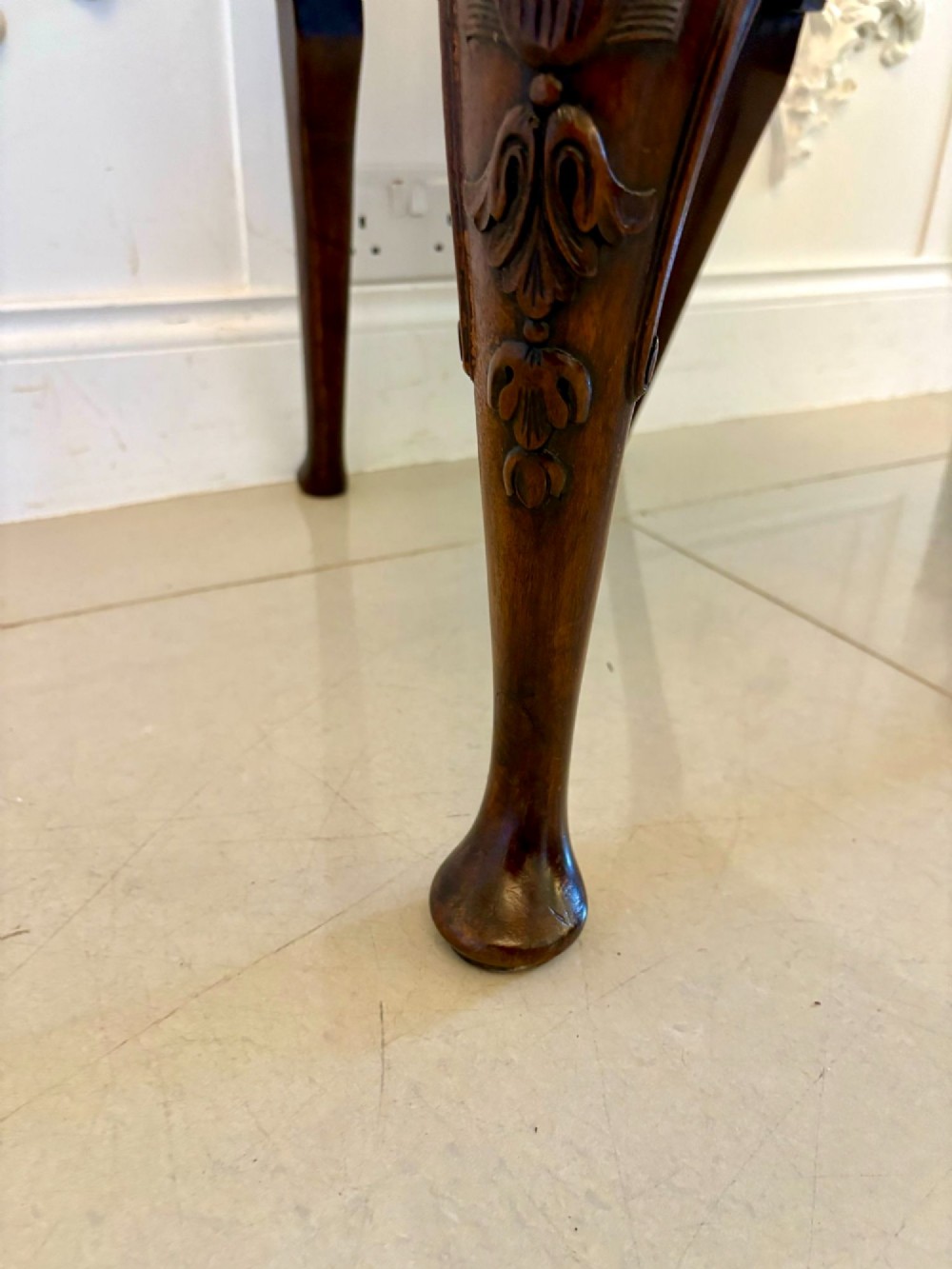 A set of six Victorian burr walnut dining chairs featuring carved top rails, vase-shaped splats, patterned upholstery, and cabriole legs. View II