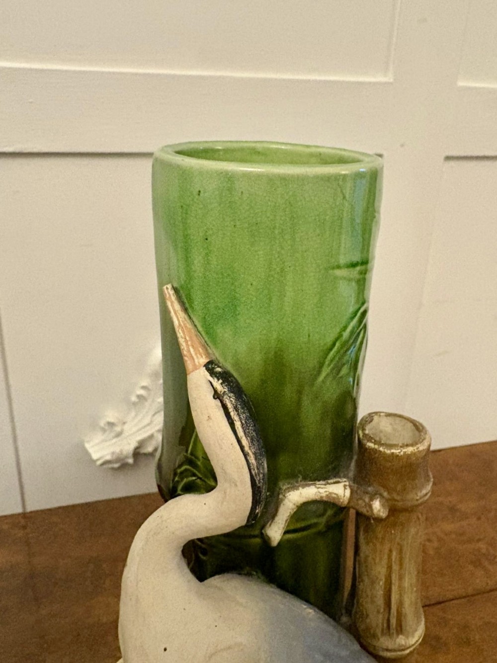 A pair of Victorian green glazed ceramic vases featuring bamboo stems and sculpted wading birds. View II