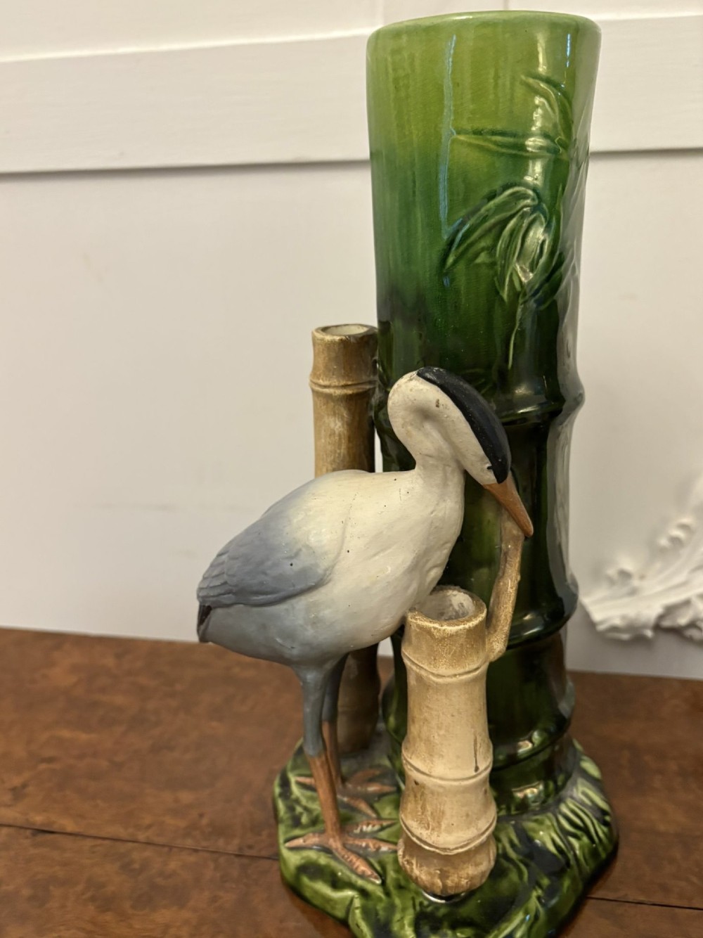 A pair of Victorian green glazed ceramic vases featuring bamboo stems and sculpted wading birds. View XI