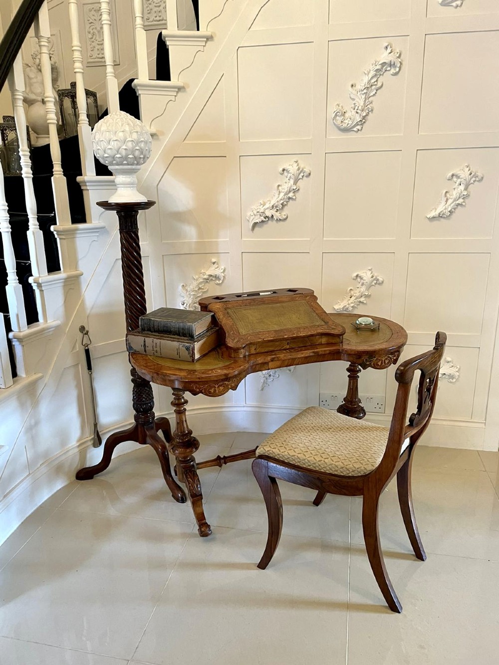 A Victorian burr walnut kidney-shaped writing table with floral marquetry inlay, green leather panels, and a central raised writing slope. View III