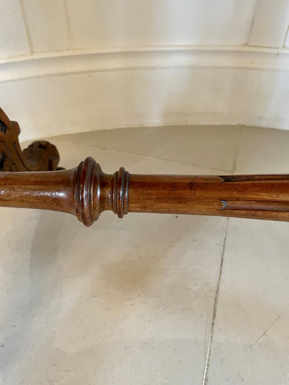 A Victorian burr walnut kidney-shaped writing table with floral marquetry inlay, green leather panels, and a central raised writing slope. View XI