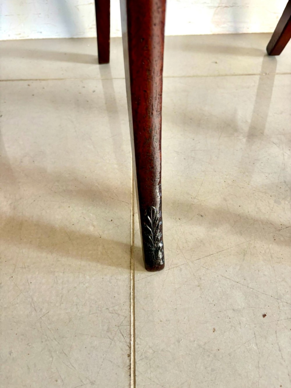 A set of six Regency mahogany dining chairs featuring carved bar-back crest rails, rosettes, and green tartan fabric upholstery. View VIII