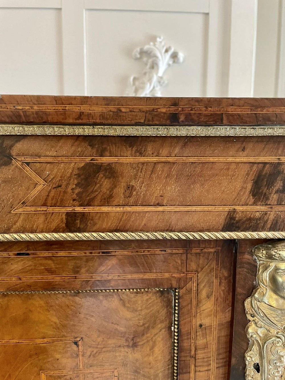 A pair of Victorian burr walnut pier cabinets featuring inlaid wood borders, gilt-bronze mounts, and central oval painted porcelain plaques. View XIII