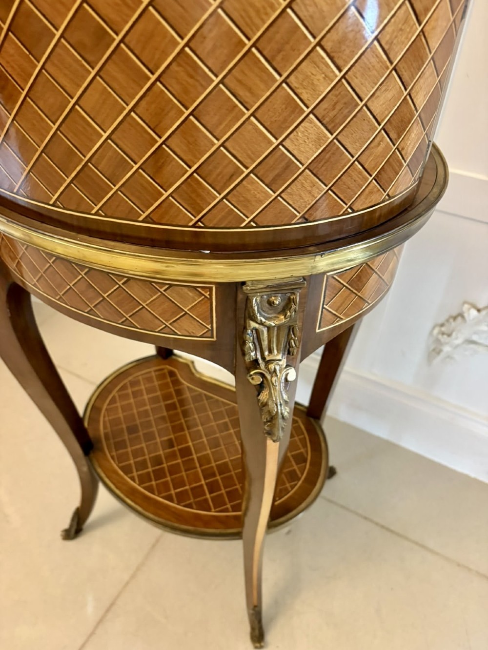 A French kingwood parquetry bonheur du jour writing desk featuring a green leather inset, marble top gallery, and gilt-bronze mounts on slender cabriole legs. View XII