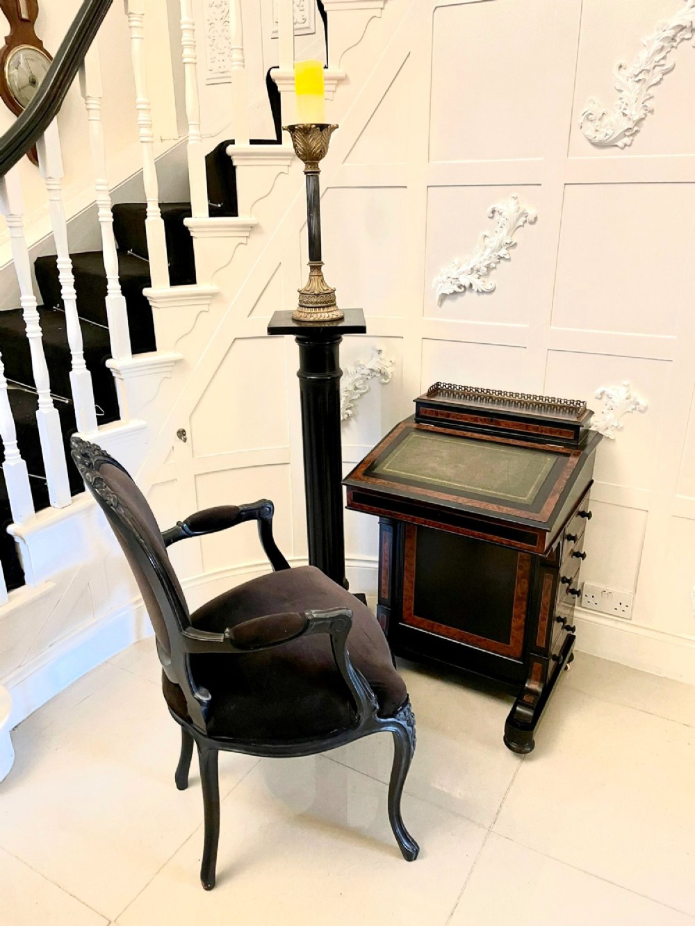 A Victorian ebonised davenport desk featuring walnut crossbanding, a sloped green leather writing surface, side drawers, and a top brass gallery rail. View III