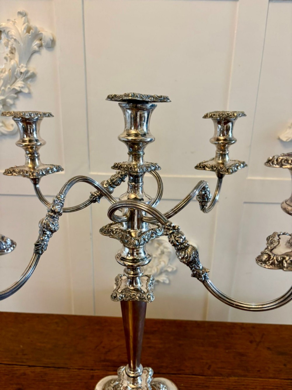 A Victorian silver-plated five-branch candelabra featuring scroll arms, ornate foliate moulding, and a shaped pedestal base. View VII