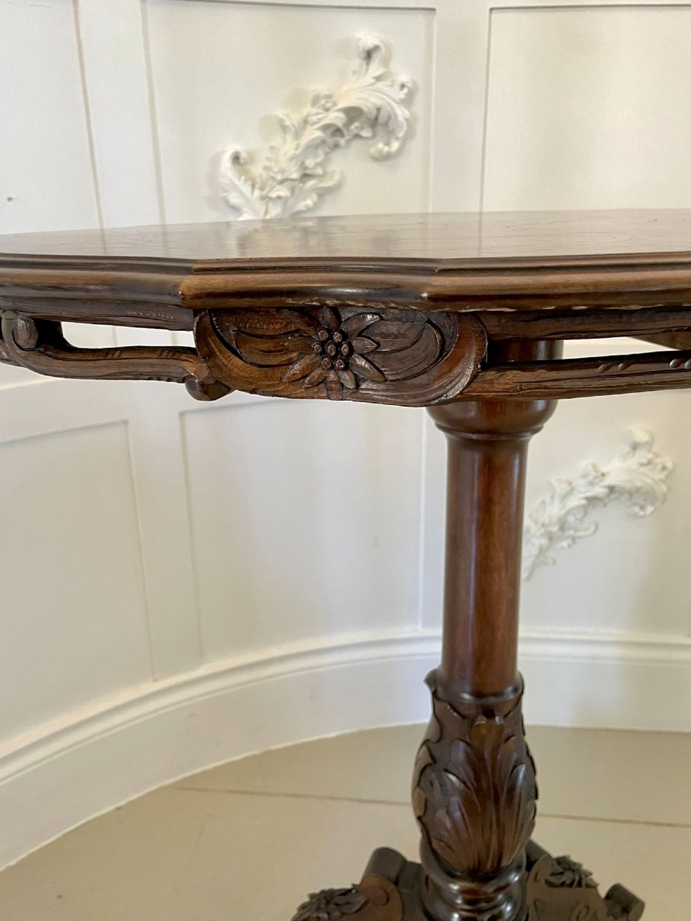 An antique walnut tilt-top side table featuring an oval top with elaborate marquetry depicting alpine wildlife and a carved tripod pedestal base. View XI