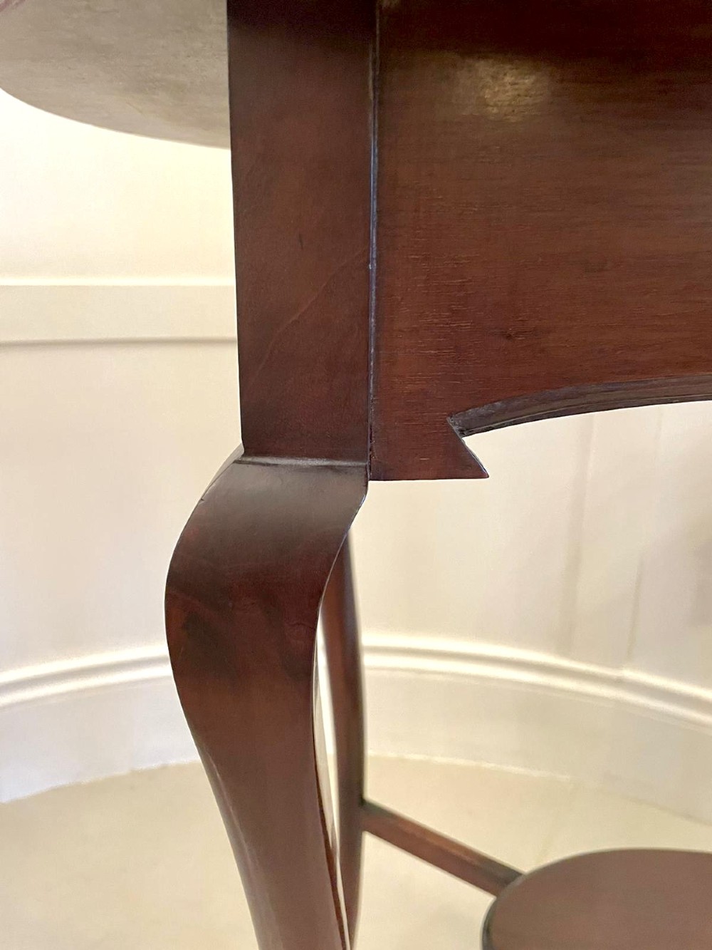 An oval mahogany lamp table featuring Art Nouveau central marquetry inlay, slender curved legs, and a lower oval shelf. View VIII