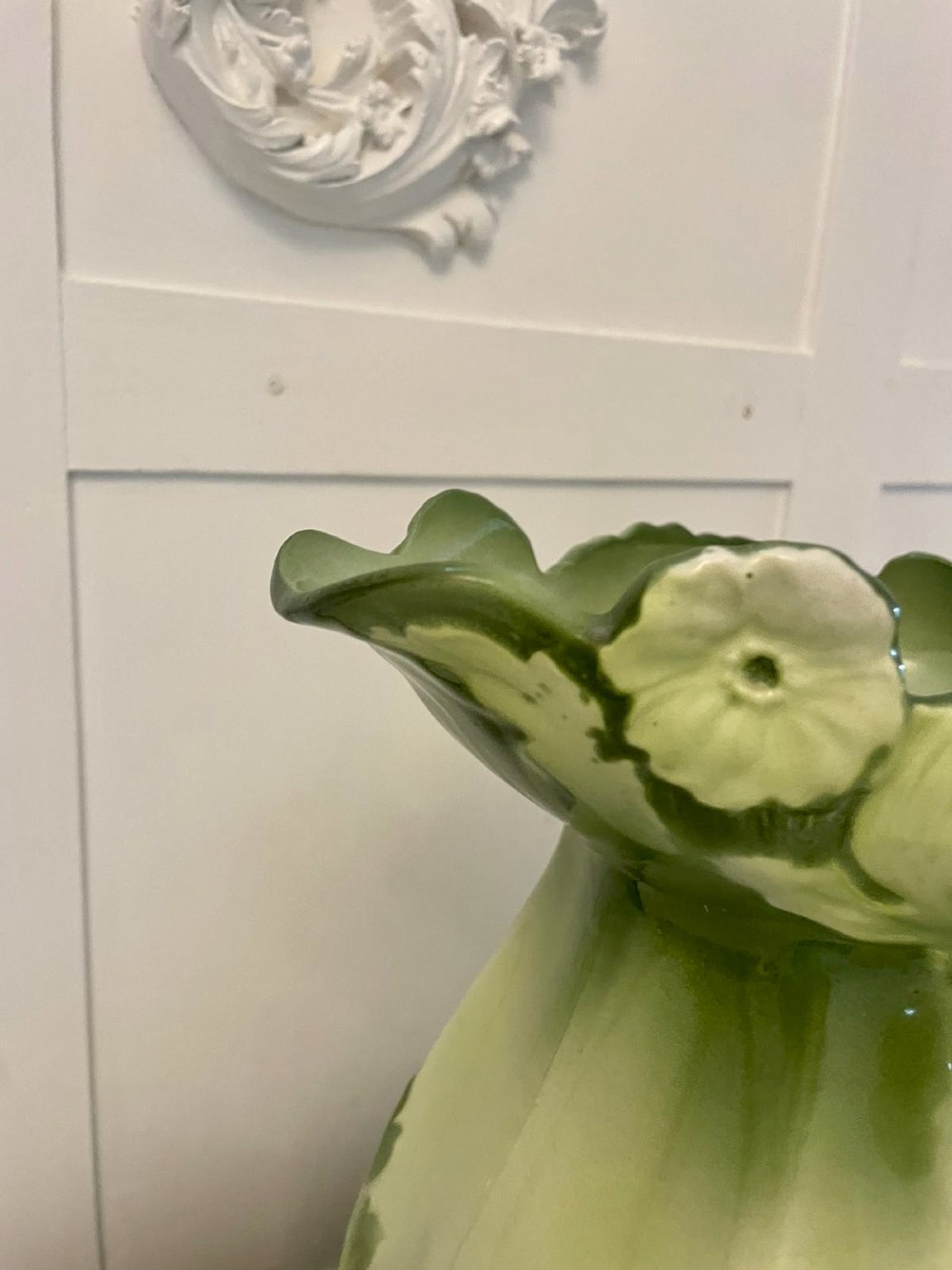 An Art Nouveau green and cream glazed ceramic jug with moulded relief leaf details resting inside a matching wash basin. View VIII