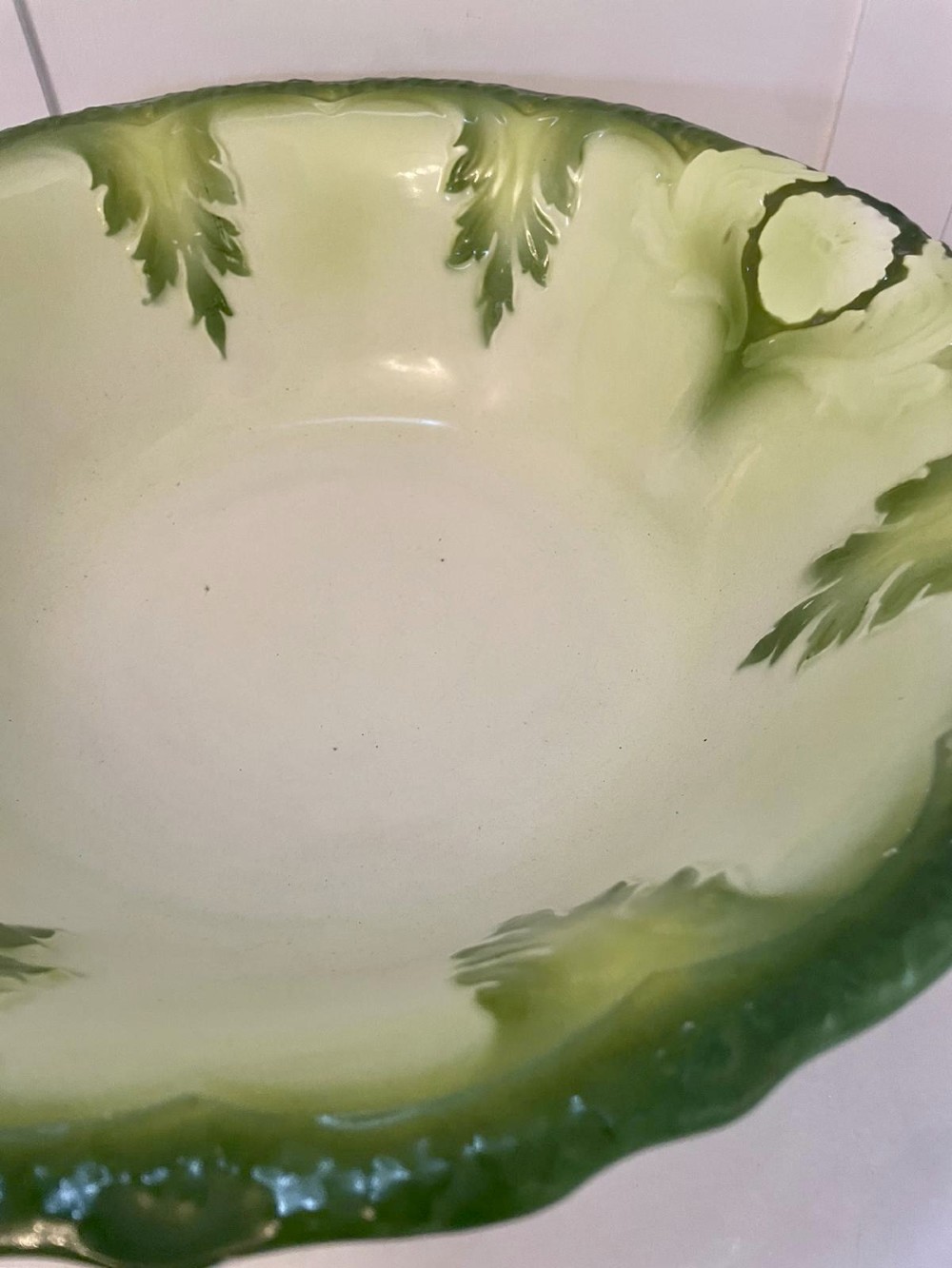 An Art Nouveau green and cream glazed ceramic jug with moulded relief leaf details resting inside a matching wash basin. View XIII