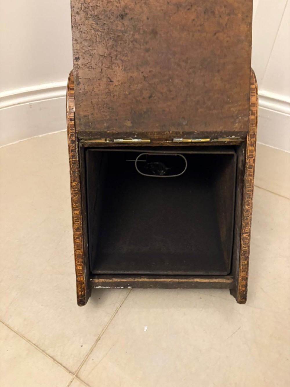 A Victorian walnut coal purdonium featuring ornate decorative brass strap hinges, brass corner plates, and a top carrying handle. View III