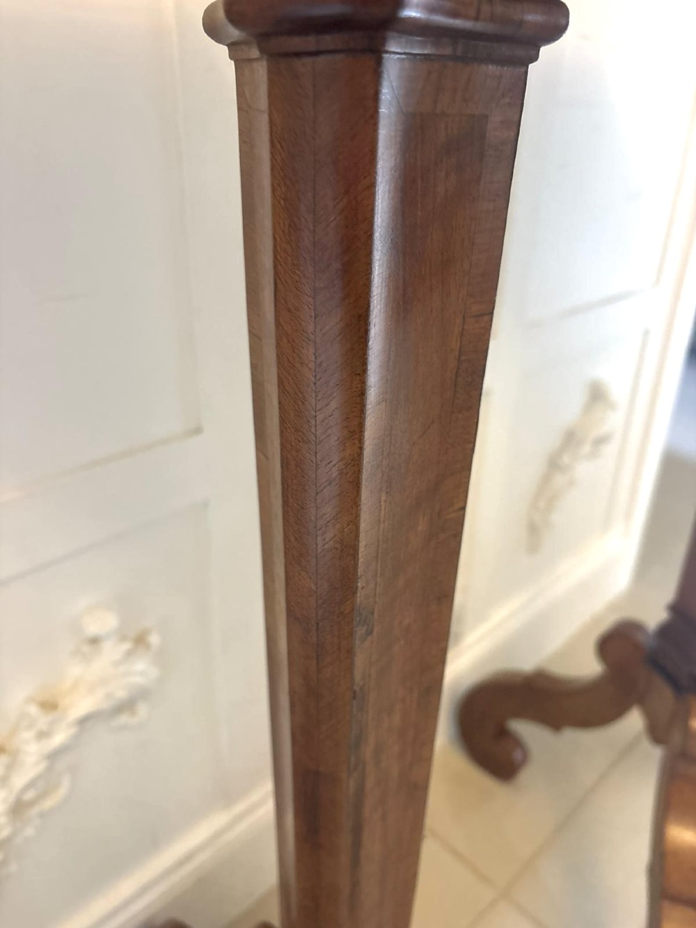 A pair of tall antique Dutch walnut and kingwood pedestal torcheres with molded hexagonal tops and scroll tripod feet. View X