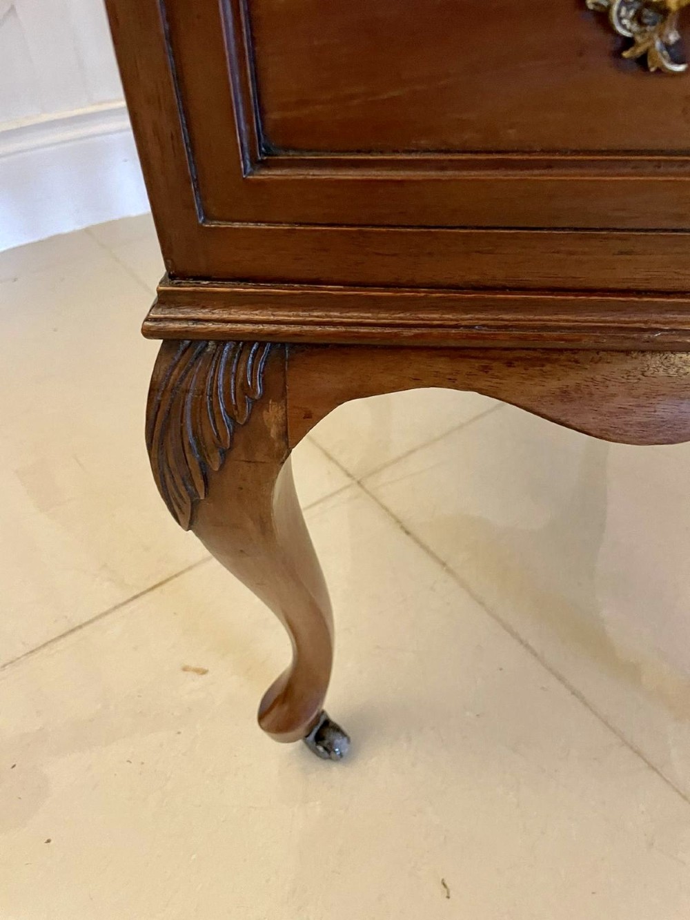 A Victorian walnut Davenport desk featuring a green leather writing slope, an upper stationery box, and carved cabriole legs on castors. View IV