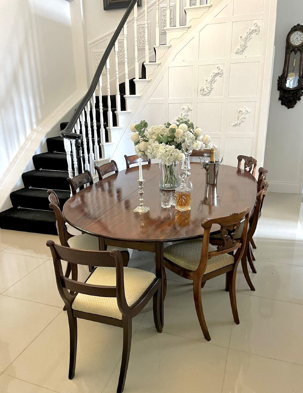 A large Georgian mahogany wake table shown with drop leaves folded down, featuring straight square legs and a polished polished timber top. View IV