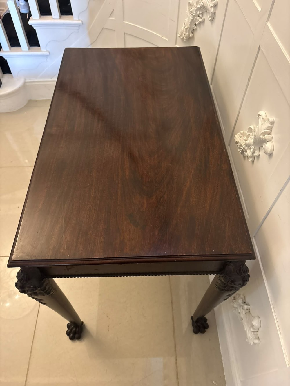 A George III mahogany centre table featuring a rectangular flat top, deep apron, and four carved legs ending in claw and ball feet. View VIII