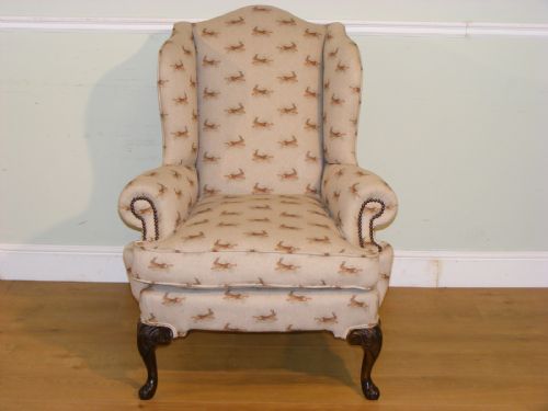AN EDWARDIAN RECENTLY REUPHOLSTERED WINGBACK ARMCHAIR - ADDITIONAL PHOTO 1