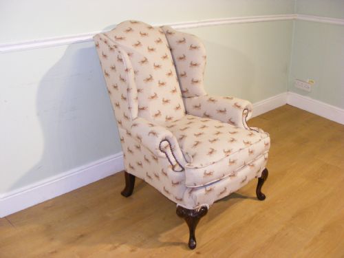 AN EDWARDIAN RECENTLY REUPHOLSTERED WINGBACK ARMCHAIR - ADDITIONAL PHOTO 3