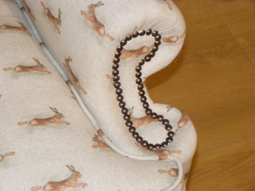 AN EDWARDIAN RECENTLY REUPHOLSTERED WINGBACK ARMCHAIR - ADDITIONAL PHOTO 5