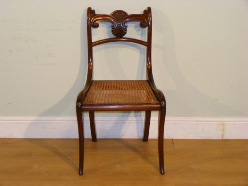 A SET OF FOUR REGENCY MAHOGANY DINING CHAIRS WITH CARVED BACK RAILS - ADDITIONAL PHOTO 2