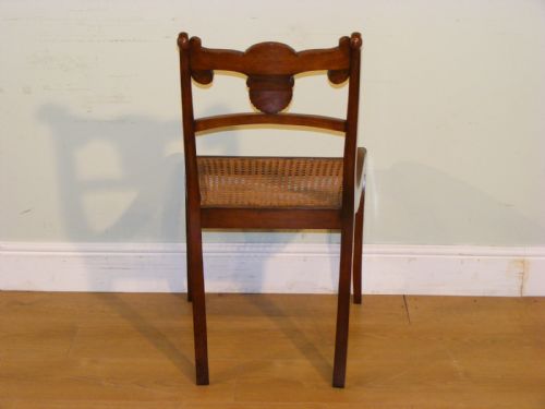 A SET OF FOUR REGENCY MAHOGANY DINING CHAIRS WITH CARVED BACK RAILS - ADDITIONAL PHOTO 7