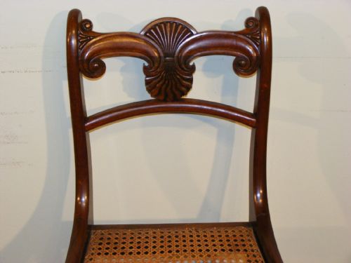 A SET OF FOUR REGENCY MAHOGANY DINING CHAIRS WITH CARVED BACK RAILS - ADDITIONAL PHOTO 8