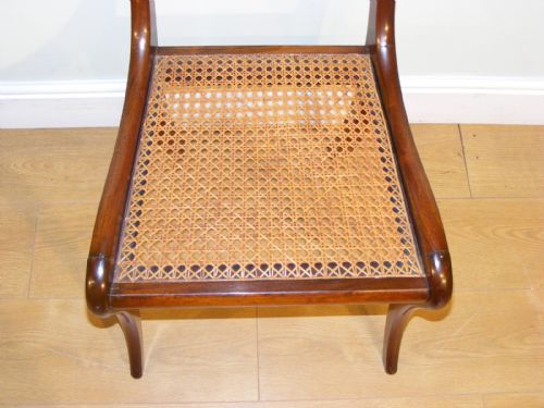A SET OF FOUR REGENCY MAHOGANY DINING CHAIRS WITH CARVED BACK RAILS - ADDITIONAL PHOTO 11