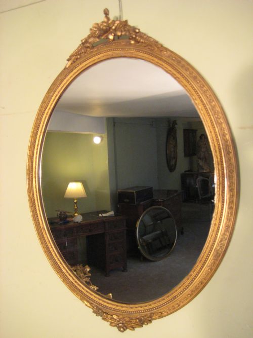 PAIR GILT OVAL MIRRORS - ADDITIONAL PHOTO 1