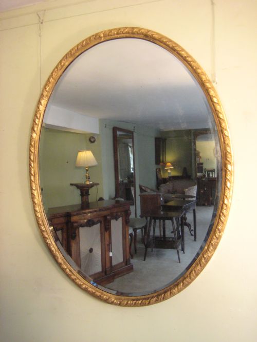 GILT OVAL MIRROR - ADDITIONAL PHOTO 1