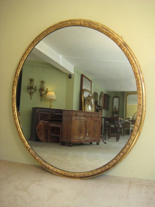 19th century very large oval gilt mirror - CATEGORY: ANTIQUE MIRRORS - DATED 1850
