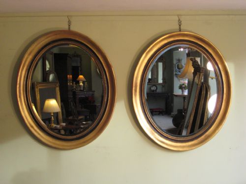 PAIR OF LARGE OVAL GILT MIRRORS - ADDITIONAL PHOTO 1