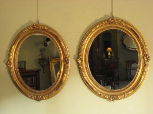 PAIR OF FRENCH GILT OVAL MIRRORS - ADDITIONAL PHOTO 1
