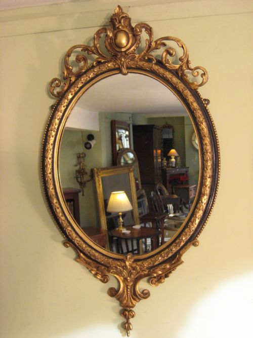 PAIR EBONISED AND PARCELGILT MIRRORS - ADDITIONAL PHOTO 1