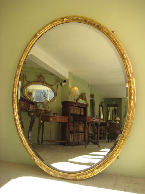 19th century english large oval gilt wall mirror - CATEGORY: ANTIQUE MIRRORS - DATED 1880