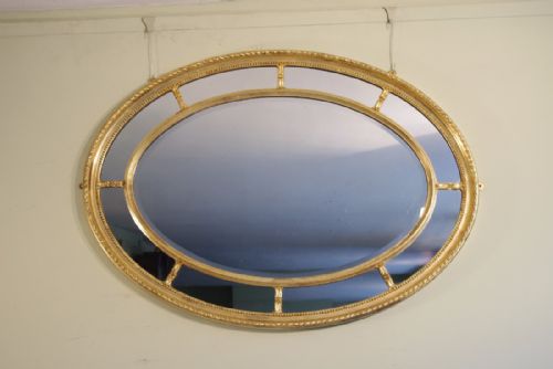 large gilt oval marginal overmantle mirror - CATEGORY: ANTIQUE MIRRORS - DATED 1900
