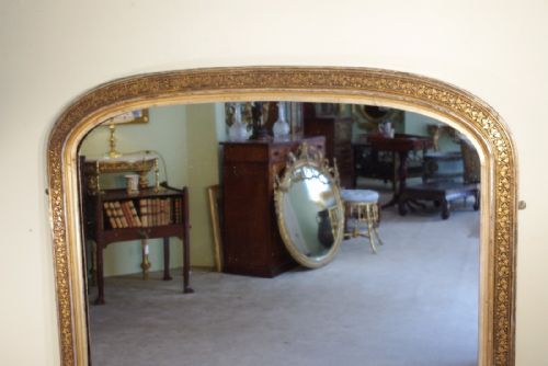 LARGE EBONISED AND PARCELGILT ARCH TOP OVERMANTLE MIRROR - ADDITIONAL PHOTO 1