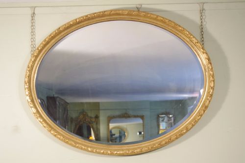 LARGE OVAL GILT WALL MIRROR - ADDITIONAL PHOTO 1