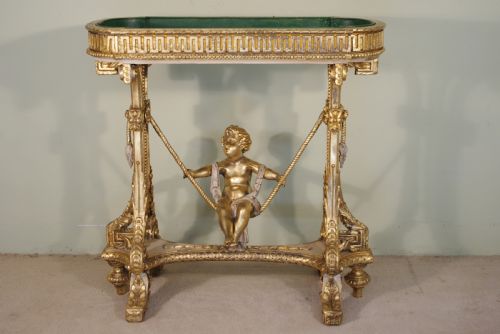 19TH CENTURY PAINTED AND PARCELGILT CHERUBPUTTO JARDENIEREPLANTER - ADDITIONAL PHOTO 1