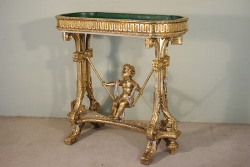 19TH CENTURY PAINTED AND PARCELGILT CHERUBPUTTO JARDENIEREPLANTER - ADDITIONAL PHOTO 2
