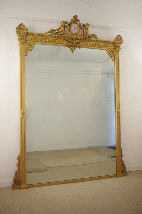 victorian gilt large overmantle mirror with 'putto' cresting - CATEGORY: ANTIQUE MIRRORS - DATED 1870