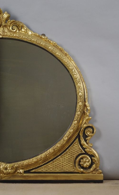 VICTORIAN GILT AND EBONISED OVAL OVERMANTLE MIRROR - ADDITIONAL PHOTO 2