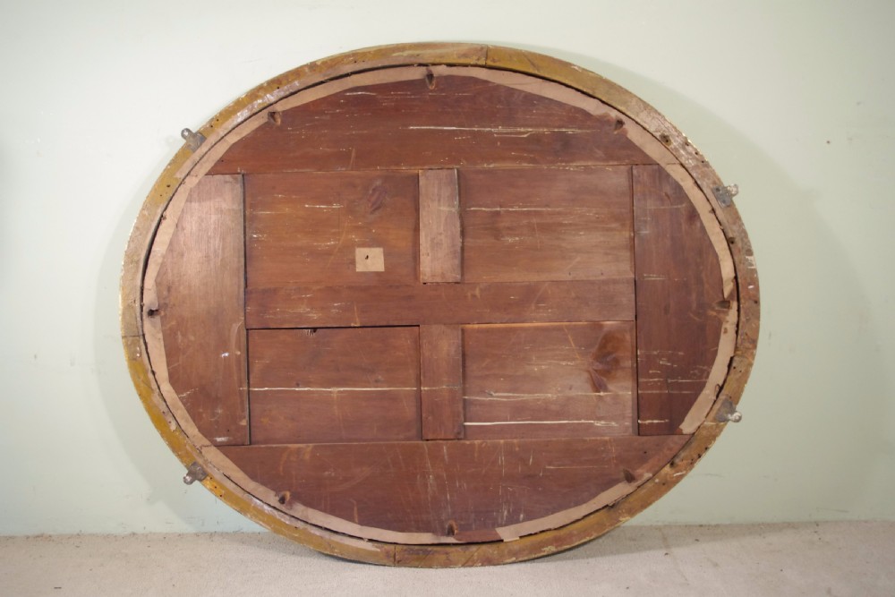 Large Oval Ebonised and Parcel-Gilt Overmantle/Wall Mirror View IX