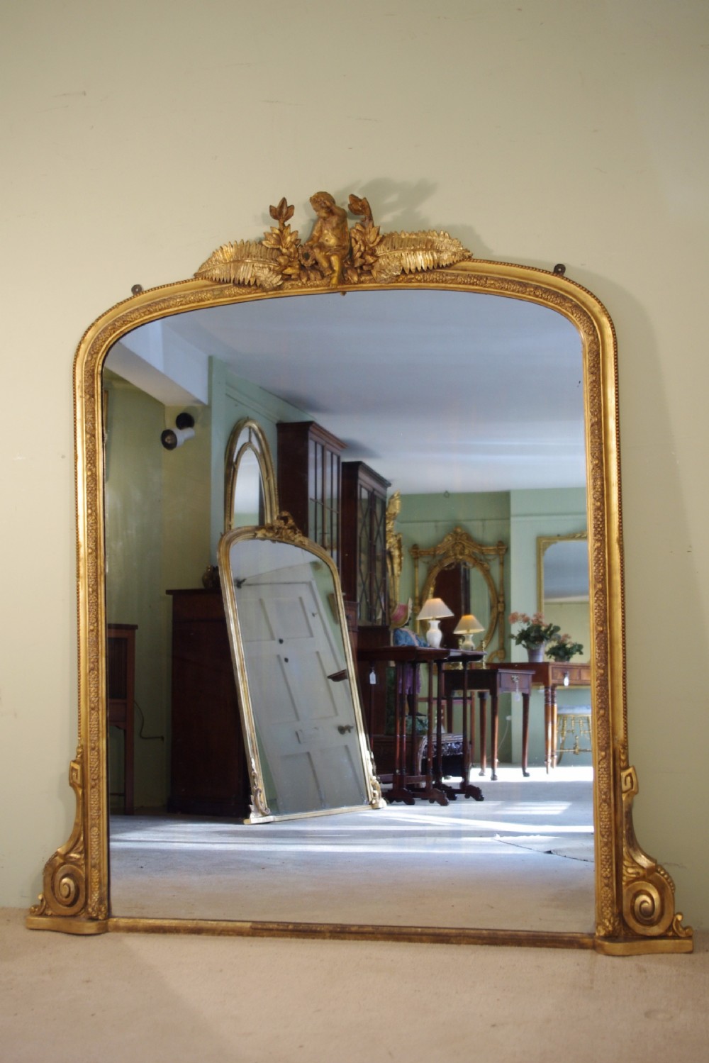 Large Gilt Arch Top Overmantle Mirror with Putto Cresting