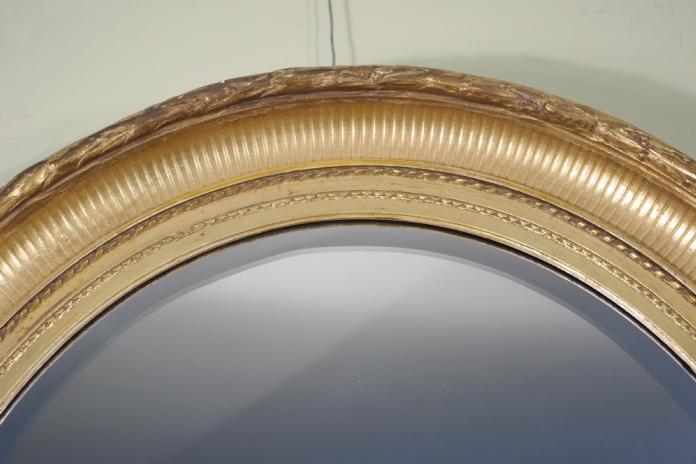 Pair English Victorian Gilt Large Oval Wall Mirrors View III