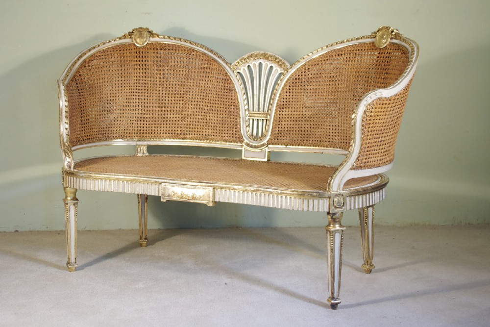 French Painted and Parcel-Gilt  Two Seater Cane Sofa View II