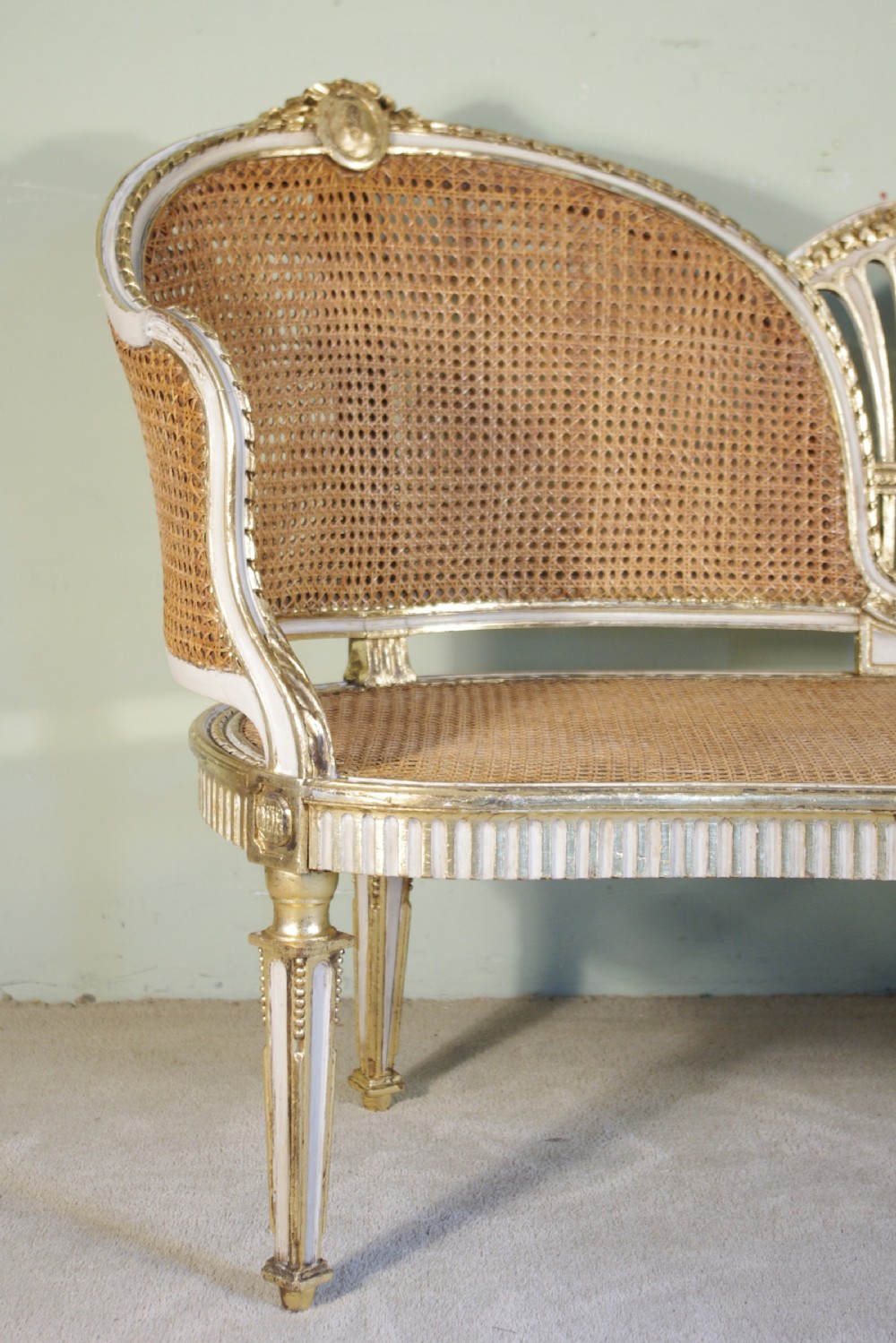 French Painted and Parcel-Gilt  Two Seater Cane Sofa View III
