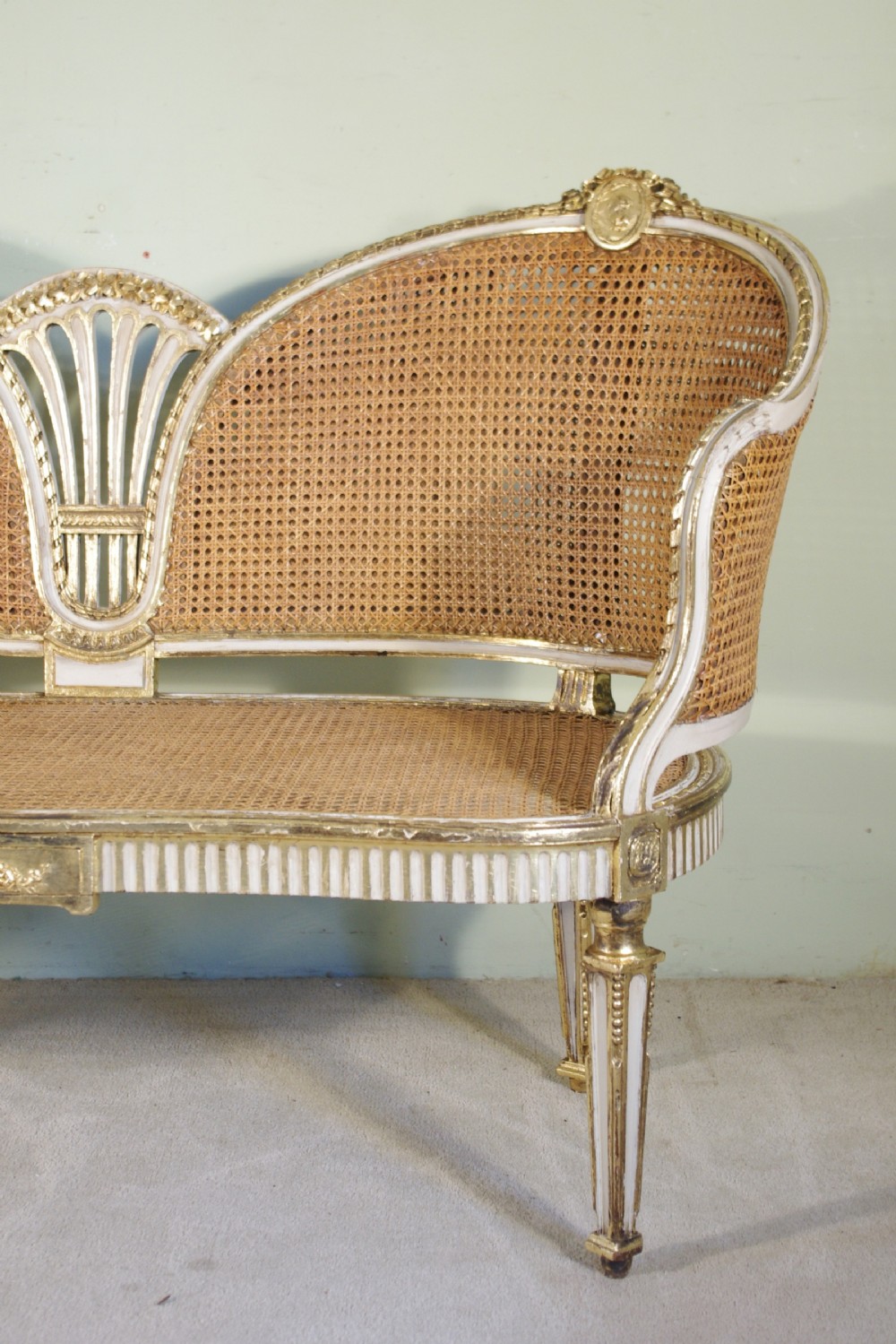 French Painted and Parcel-Gilt  Two Seater Cane Sofa View IV
