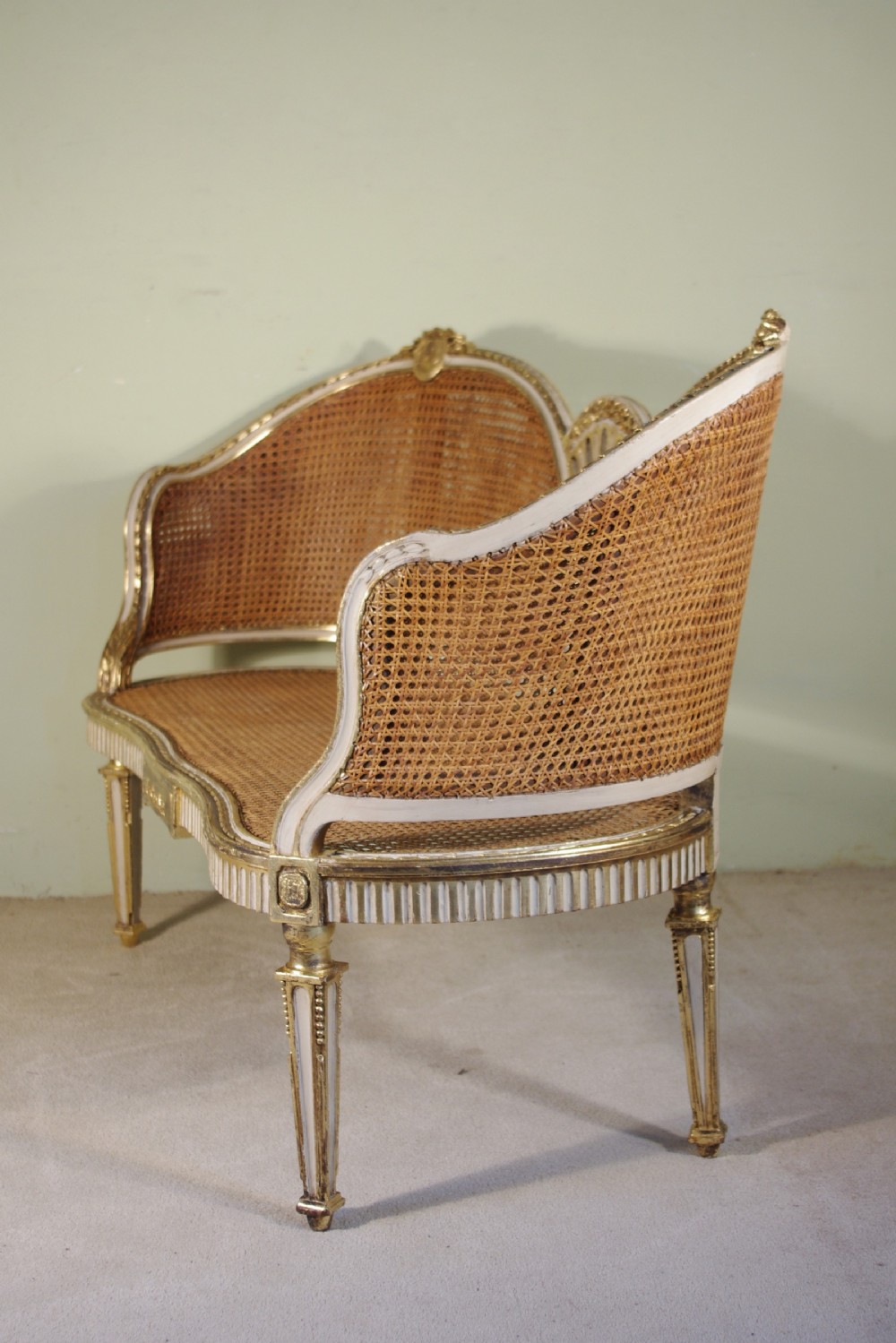 French Painted and Parcel-Gilt  Two Seater Cane Sofa View XI