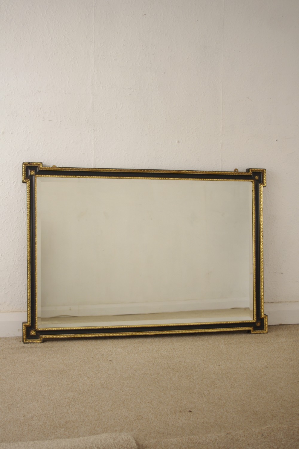 Ebonised and Parcel-Gilt Overmantle/Wall Mirror